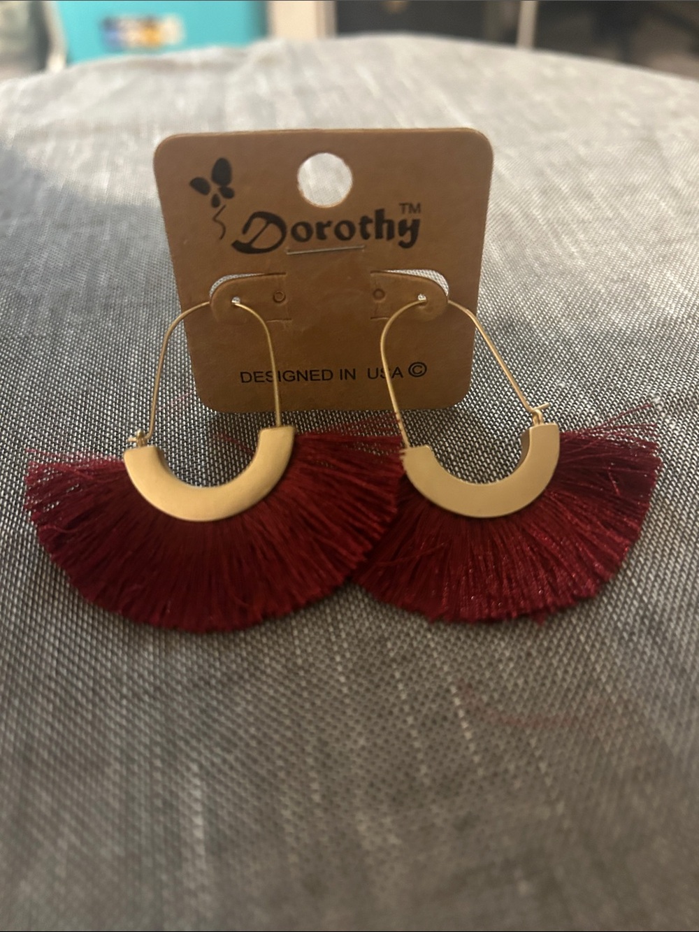 Dorothy Gold Half-Moon Fan Tassel Earrings in Burgundy